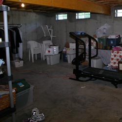 An unfinished basement filled with clutter in Bridgeton.