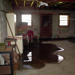 A flooded basement showing groundwater intrusion in Vineland