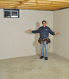 Absecon basement insulation covered by EverLast™ wall paneling, with SilverGlo insulation underneath