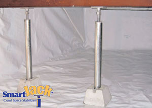 Crawl space structural support jacks installed in Minotola