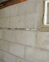 Severely buckling foundation walls in a home in Manchester Township in need of repairs.