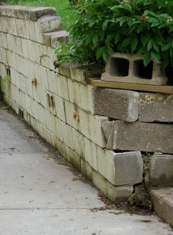 collapsing retaining wall with severe damage in Brigantine
