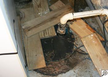 An ugly, clogged sump pump system in Absecon, New Jersey