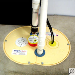 A sump pump system installed along a basement floor in Vineland.