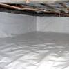 A crawl space vapor barrier has been installed on the walls and floors of this space in Absecon.