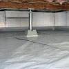 a sealed, encapsulated crawl space with structural repairs present in Millville.