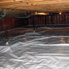 A sealed crawl space with support posts showing in Bridgeton.