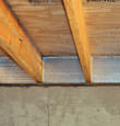 SilverGlo™ insulation installed in a floor joist in Williamstown