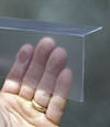 Closeup of a clear plastic covering on a Millville crawl space block wall