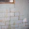 A cracked foundation wall near a window in a Manchester Township home