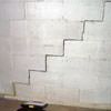 A diagonal stair step crack along the foundation wall of a Mays Landing home