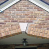 Major tuckpointing on a home archway over a door, with tuckpointing several inches wide that has failed on a Vineland home