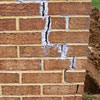 Tuckpointing that cracked due to foundation settlement of a Sicklerville home