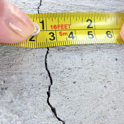 A crack in a poured concrete wall that's showing a normal crack during curing in Brigantine