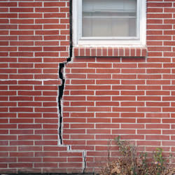 A foundation with a large crack that's wider at the top than on the bottom in Egg Harbor City