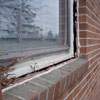 A gap in a window along the outer wall due to foundation settlement of a Egg Harbor Township home.