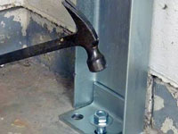 Mounting a foundation channel anchor installation to the floor in Cherry Hill.