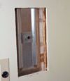 Wall anchor plates installed during a foundation repair in Sicklerville in a finished basement