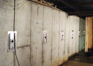 A foundation wall in Woodstown repaired with foundation wall anchors.