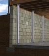I-beam foundation wall supports installed in a Woodstown basement.