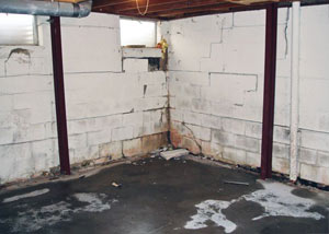 A failed, rusty i-beam foundation wall system installed in Egg Harbor City.