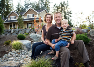 A happy family outside a home with a repaired foundation in Ocean City