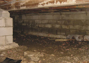 Rotting, decaying crawl space wood damaged over time in Ocean City