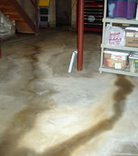 Flooding entering a basement through a floor crack in Winslow