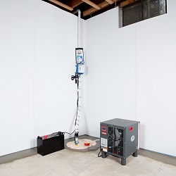 a complete basement waterproofing system installed in a Sicklerville home