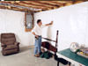 A basement wall covering for creating a vapor barrier on basement walls in Chester