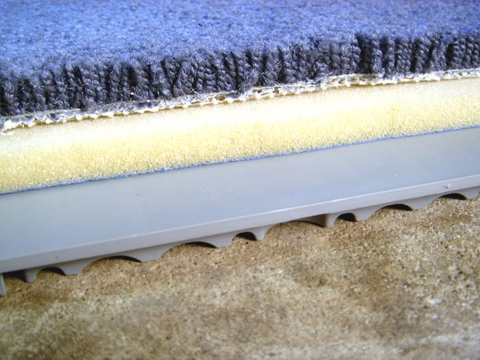 Basement Sub Floor Matting Options In Marlton Sicklerville Cherry A Closeup View Of Our Sub Floor Matting With Basement Carpet Installed On Top