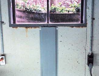 Repaired waterproofed basement window leak in Philadelphia